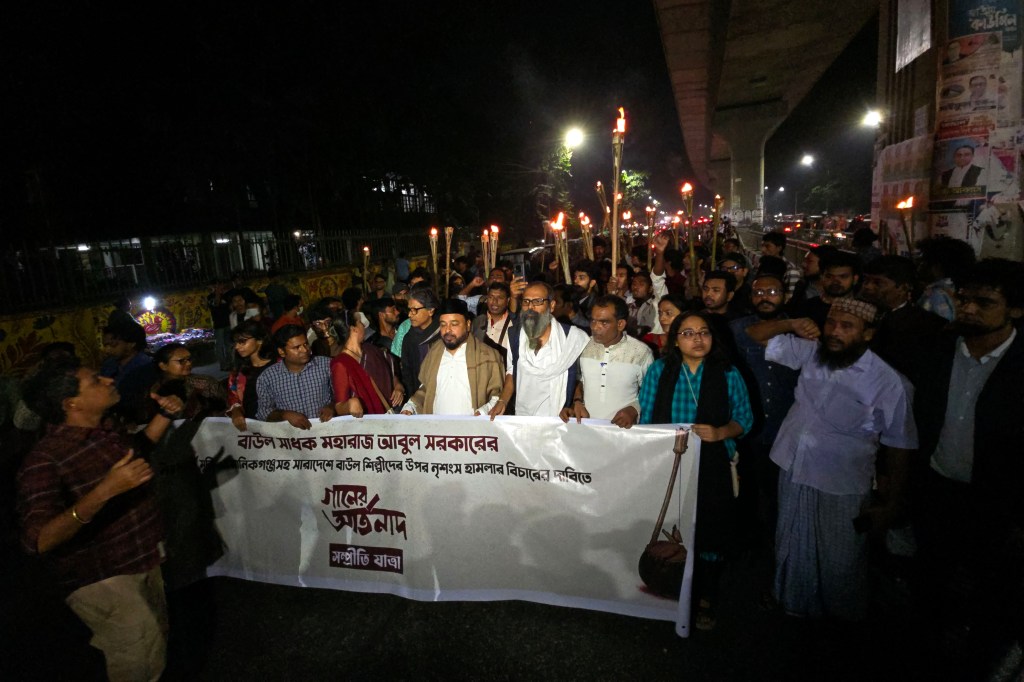 Cultural activists and students are marching through the University of Dhaka campus to protest the increasing repression against Baul traditions and folk artists. November 28, 2025.